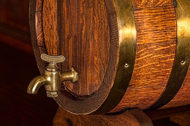 Craft beer taps and barrels in a warm pub interior